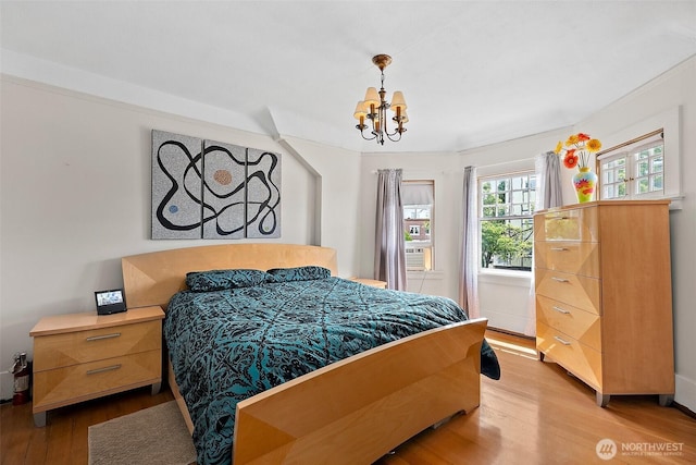 1222 N 4th St, Tacoma, WA 98403 - bedroom featuring a chandelier and wood finished floors
