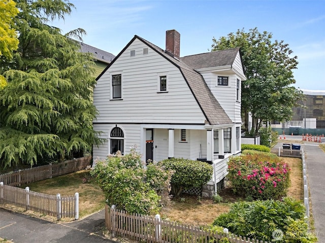 1222 N 4th St, Tacoma, WA 98403 - view of front of property featuring roof with shingles and a chimney