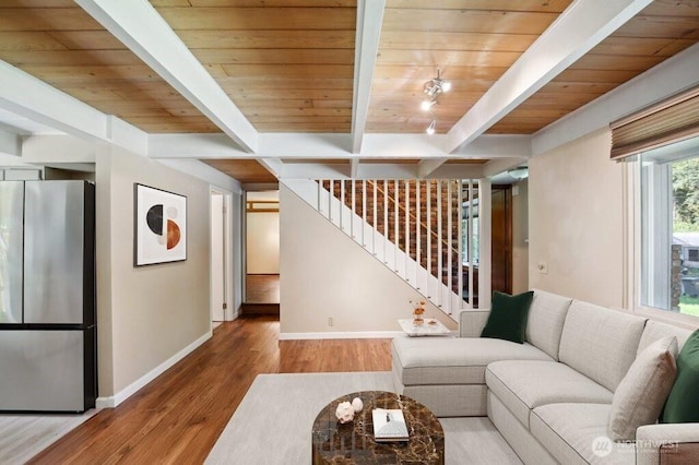 1111 Garrison Ave, Port Orchard, WA 98366 - living area featuring wood finished floors, stairs, and a wooden ceiling with exposed beams