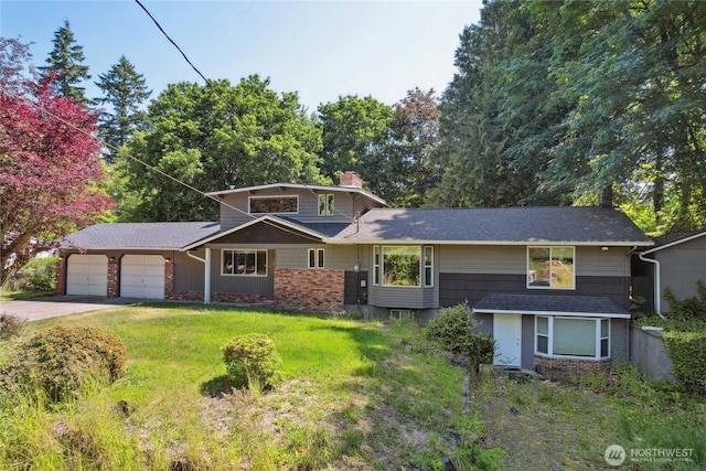 1111 Garrison Ave, Port Orchard, WA 98366 - view of front of property with a garage, a front yard, a chimney, and driveway