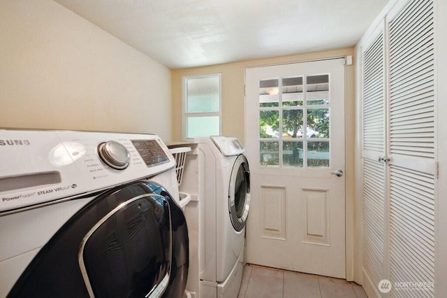 1111 Garrison Ave, Port Orchard, WA 98366 - laundry area featuring separate washer and dryer and light tile patterned flooring