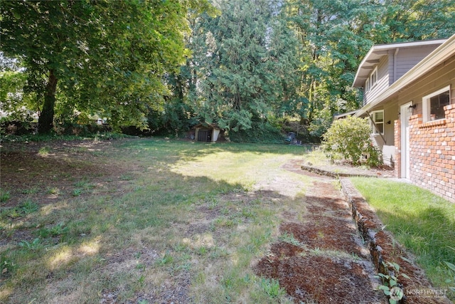 1111 Garrison Ave, Port Orchard, WA 98366 - view of yard featuring a storage shed