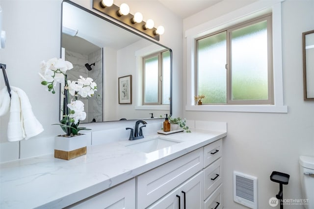 1626 E 59th St, Tacoma, WA 98404 - bathroom featuring vanity, a shower, and heating unit