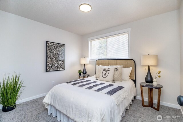 1626 E 59th St, Tacoma, WA 98404 - carpeted bedroom featuring baseboards