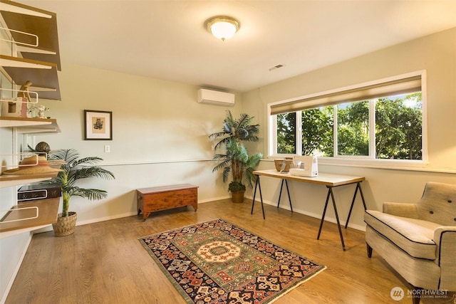 27727 94th Ave SW, Vashon, WA 98070 - home office with wood finished floors and a wall mounted AC