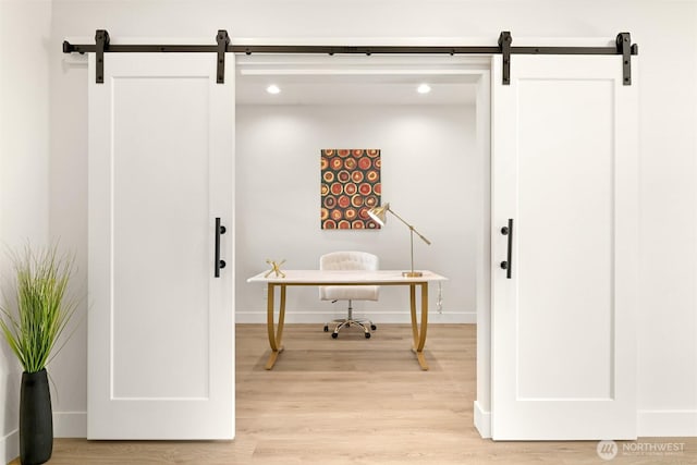 710 E 4th St, Nooksack, WA 98276 - home office featuring a barn door, light wood-type flooring, and recessed lighting