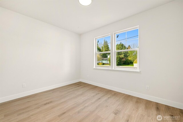 710 E 4th St, Nooksack, WA 98276 - spare room featuring baseboards and light wood-type flooring