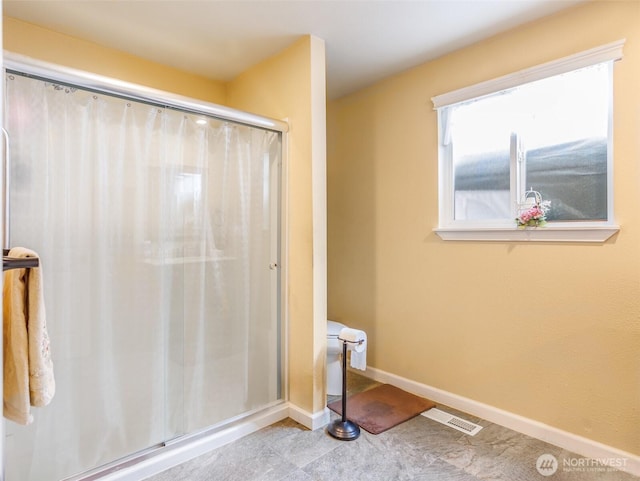 6725 Husky Way SE, Olympia, WA 98503 - bathroom featuring a shower with shower curtain and baseboards