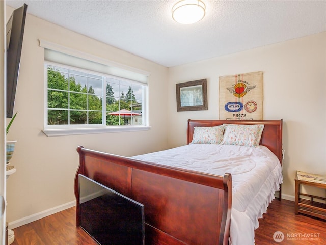 6725 Husky Way SE, Olympia, WA 98503 - bedroom featuring wood finished floors and a textured ceiling