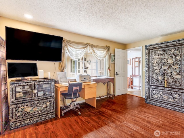 6725 Husky Way SE, Olympia, WA 98503 - home office featuring a textured ceiling, wood finished floors, and healthy amount of natural light
