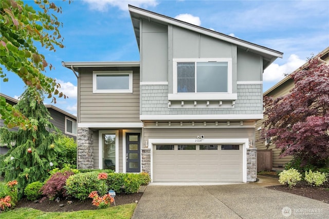 23228 SE 50th St, Issaquah, WA 98029 - view of front of property featuring stone siding, driveway, and a garage