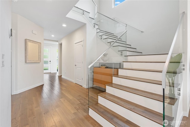 23228 SE 50th St, Issaquah, WA 98029 - stairway with plenty of natural light, wood finished floors, and recessed lighting