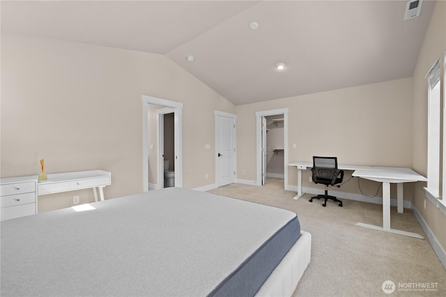 2204 176th Pl SW Unit 3, Lynnwood, WA 98037 - bedroom featuring lofted ceiling, light carpet, and a walk in closet
