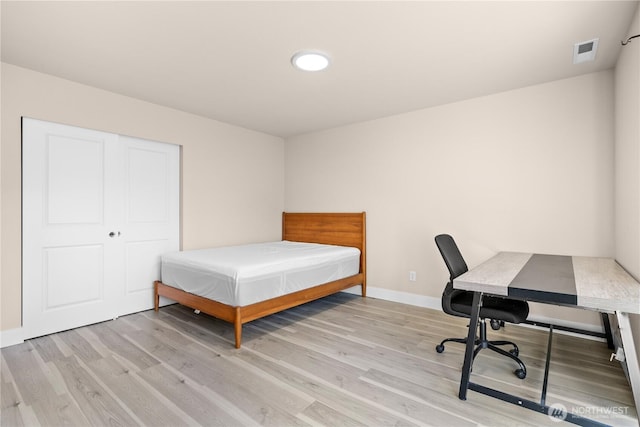 2204 176th Pl SW Unit 3, Lynnwood, WA 98037 - bedroom featuring light wood finished floors and a closet