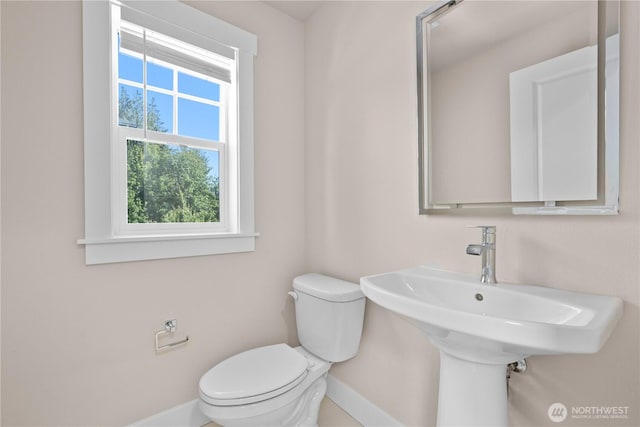 2204 176th Pl SW Unit 3, Lynnwood, WA 98037 - half bathroom featuring baseboards and toilet