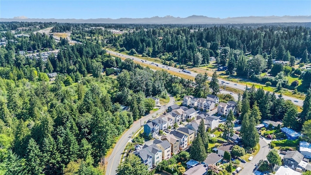 2204 176th Pl SW Unit 3, Lynnwood, WA 98037 - aerial view of property and surrounding area featuring a heavily wooded area and mountains