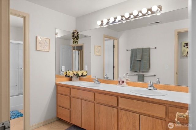 3607 Walthew Dr SE, Lacey, WA 98503 - bathroom with double vanity, tile patterned flooring, and shower / bathtub combination