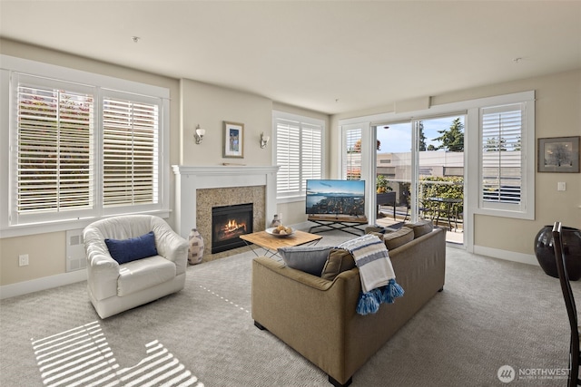616 Glen St Unit 101, Edmonds, WA 98020 - living room with a fireplace with flush hearth, healthy amount of natural light, and carpet floors