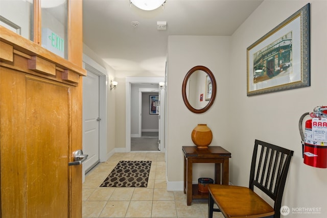 616 Glen St Unit 101, Edmonds, WA 98020 - hall featuring light tile patterned flooring and baseboards