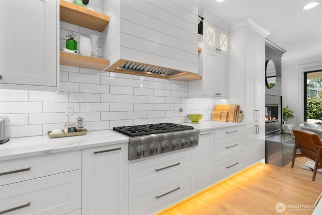 3705 N 18th St, Tacoma, WA 98406 - kitchen featuring premium range hood, stainless steel gas stovetop, open shelves, and tasteful backsplash