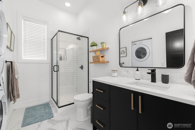 3705 N 18th St, Tacoma, WA 98406 - full bathroom featuring washer / dryer, vanity, a shower stall, recessed lighting, and marble finish flooring