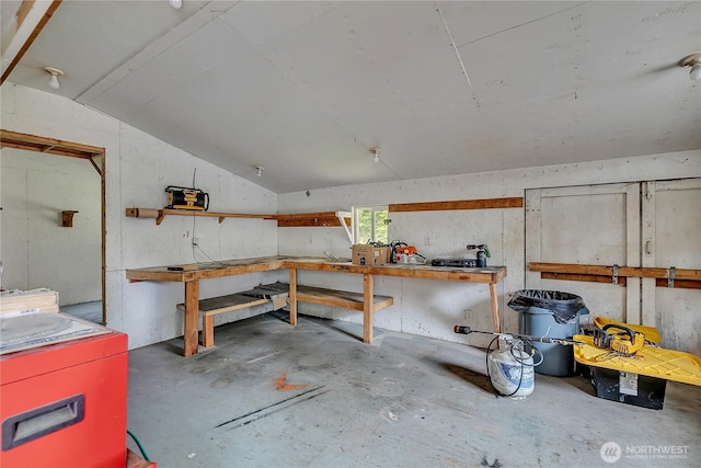 9540 El Camino Ln SE, Yelm, WA 98597 - garage featuring a workshop area