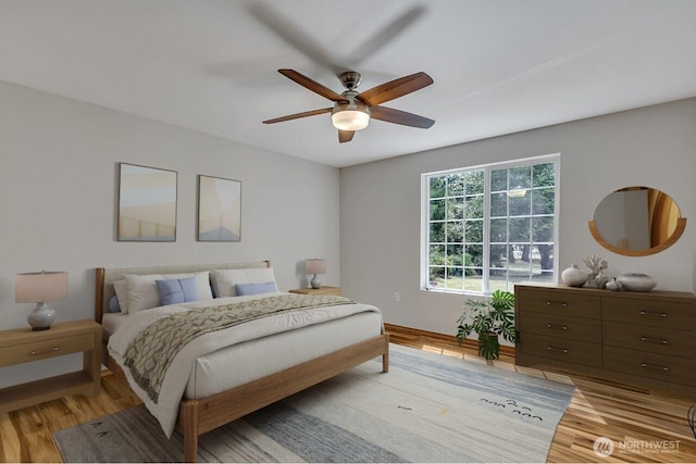 9540 El Camino Ln SE, Yelm, WA 98597 - bedroom featuring light wood finished floors and a ceiling fan