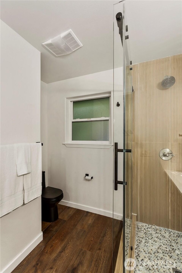 28 Lost Lake Ln, Bellingham, WA 98229 - full bathroom featuring a stall shower and wood finished floors
