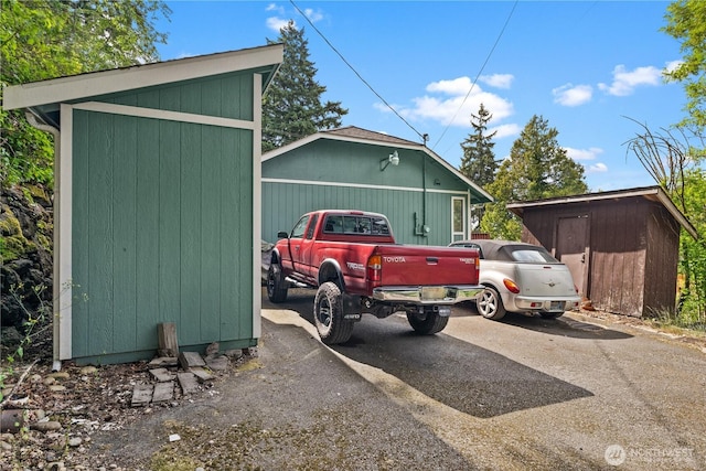 7445S Pine St, Tacoma, WA 98409 - view of home's exterior featuring a storage unit