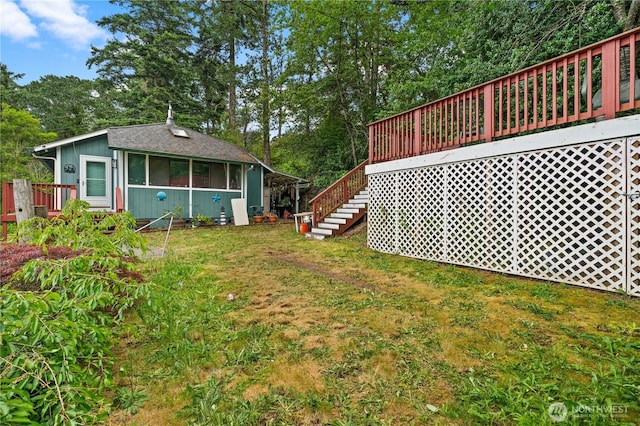 7445S Pine St, Tacoma, WA 98409 - view of grassy yard featuring a deck, stairway, and view of scattered trees