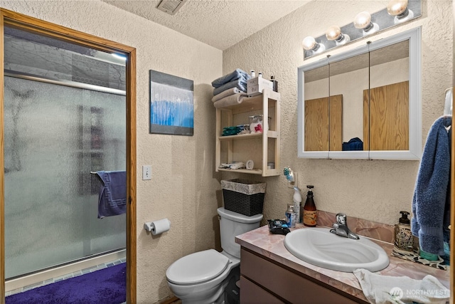 7445S Pine St, Tacoma, WA 98409 - bathroom featuring a textured wall, vanity, a stall shower, and a textured ceiling