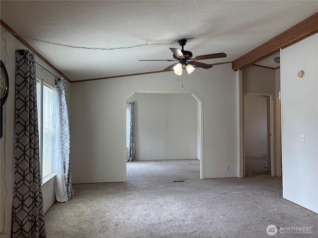 7519 18th Avenue Ct E, Tacoma, WA 98404 - carpeted empty room with a ceiling fan, a textured ceiling, and beam ceiling