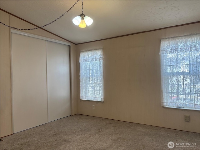 7519 18th Avenue Ct E, Tacoma, WA 98404 - unfurnished room with carpet floors and ornamental molding