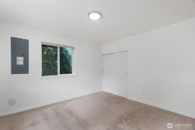 212 Euclid Ave, Shelton, WA 98584 - spare room featuring electric panel and carpet