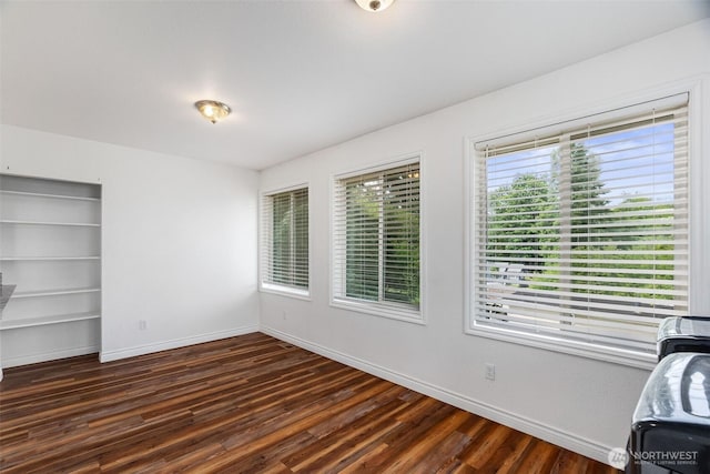 212 Euclid Ave, Shelton, WA 98584 - unfurnished bedroom featuring wood finished floors and baseboards