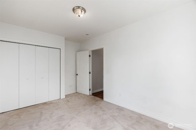212 Euclid Ave, Shelton, WA 98584 - unfurnished bedroom featuring carpet flooring and a closet