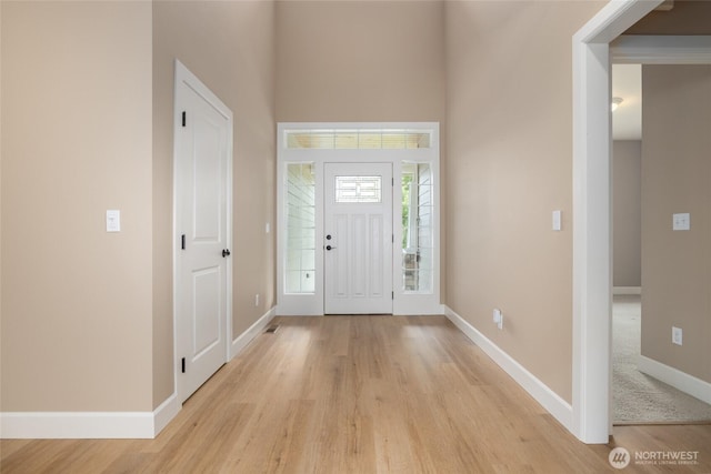 24210 Nookachamp Hills Dr, Mount Vernon, WA 98274 - entrance foyer with light wood finished floors and a high ceiling
