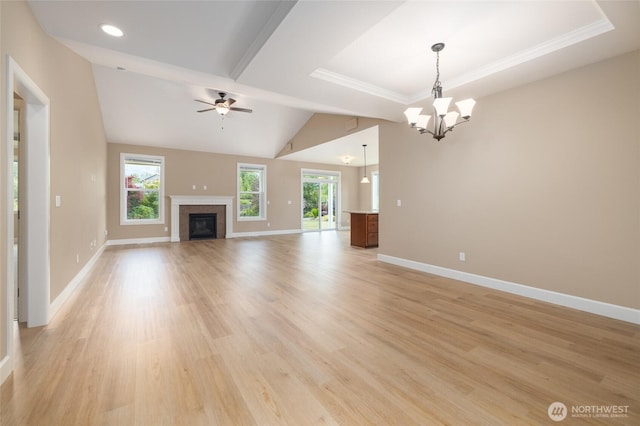 24210 Nookachamp Hills Dr, Mount Vernon, WA 98274 - unfurnished living room featuring a chandelier, a tile fireplace, ceiling fan, light wood finished floors, and recessed lighting
