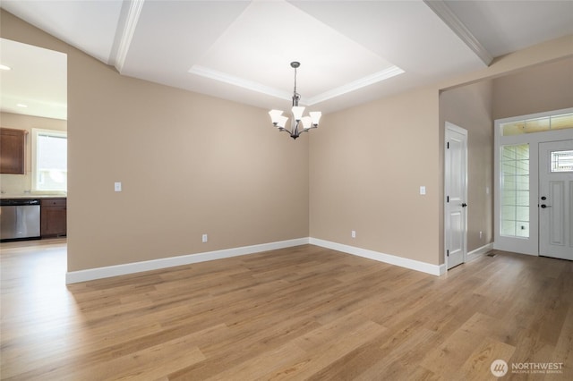 24210 Nookachamp Hills Dr, Mount Vernon, WA 98274 - foyer entrance featuring a chandelier, healthy amount of natural light, light wood-style floors, a tray ceiling, and ornamental molding
