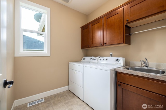 24210 Nookachamp Hills Dr, Mount Vernon, WA 98274 - laundry area featuring independent washer and dryer and cabinet space
