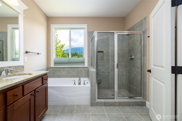 24210 Nookachamp Hills Dr, Mount Vernon, WA 98274 - bathroom with vanity, a bath, a shower stall, and tile patterned flooring
