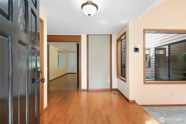 6425 Miner Dr SW, Tumwater, WA 98512 - foyer entrance with light wood-type flooring and baseboards