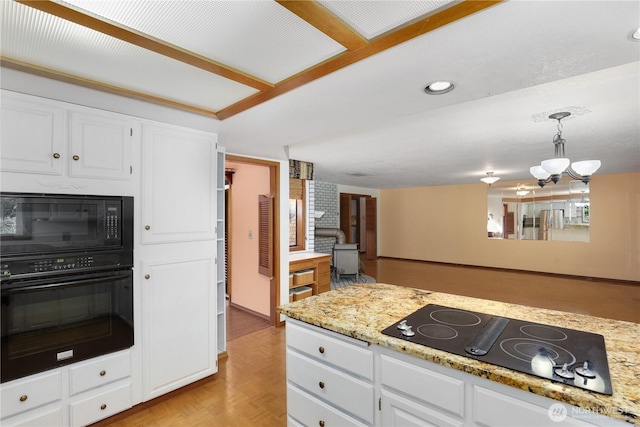 6425 Miner Dr SW, Tumwater, WA 98512 - kitchen featuring black appliances, white cabinetry, a chandelier, recessed lighting, and pendant lighting