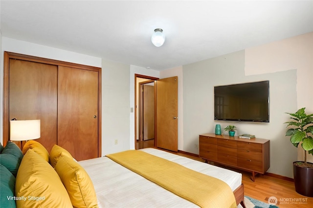 6425 Miner Dr SW, Tumwater, WA 98512 - bedroom featuring light wood-style flooring and a closet
