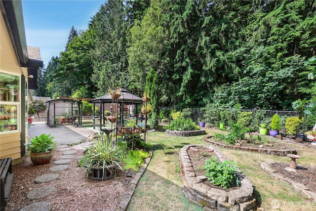 6425 Miner Dr SW, Tumwater, WA 98512 - fenced backyard with a gazebo and a patio