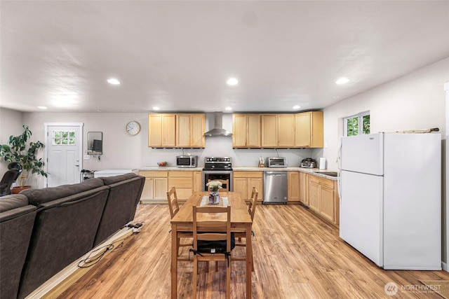 2927 Youngs Rd, Custer, WA 98240 - kitchen with stainless steel appliances, wall chimney exhaust hood, light brown cabinets, open floor plan, and recessed lighting