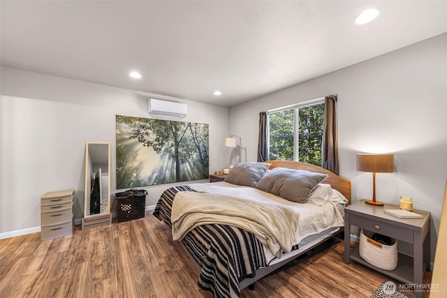 2927 Youngs Rd, Custer, WA 98240 - bedroom featuring an AC wall unit, recessed lighting, and wood finished floors
