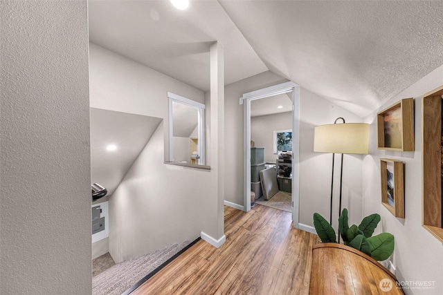 2927 Youngs Rd, Custer, WA 98240 - corridor featuring wood finished floors and lofted ceiling