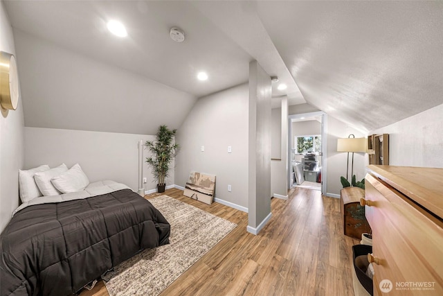 2927 Youngs Rd, Custer, WA 98240 - bedroom featuring light wood-style flooring, vaulted ceiling, and recessed lighting