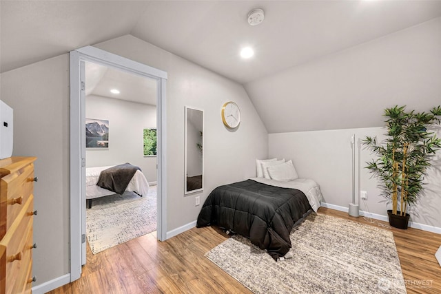2927 Youngs Rd, Custer, WA 98240 - bedroom featuring vaulted ceiling, light wood-type flooring, and recessed lighting